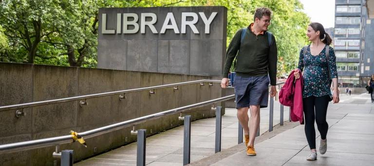 Students talking and walking outside the Main Library (looking towards 40 George Square)  [Laurence Winram]