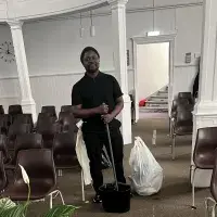 Elisha Lugoloobi, Life Church Edinburgh cleaning tasks. Staff volunteering.