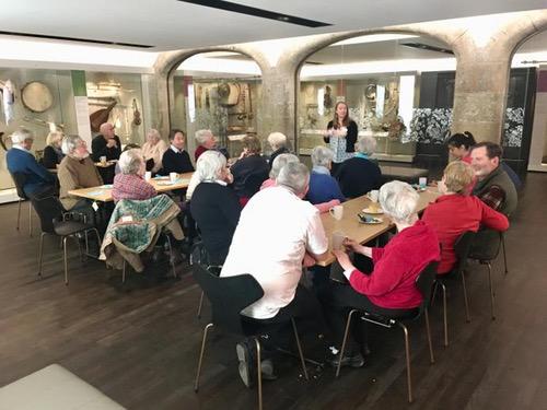 Sarah Deters with visitors at St Ceceila's Hall