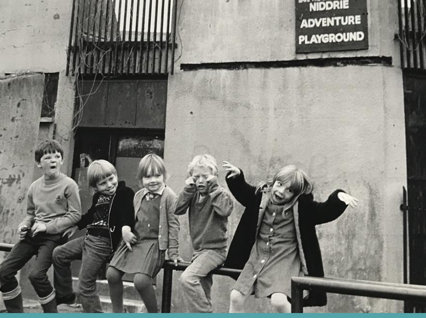 Young people outside the Niddrie Adventure Playground